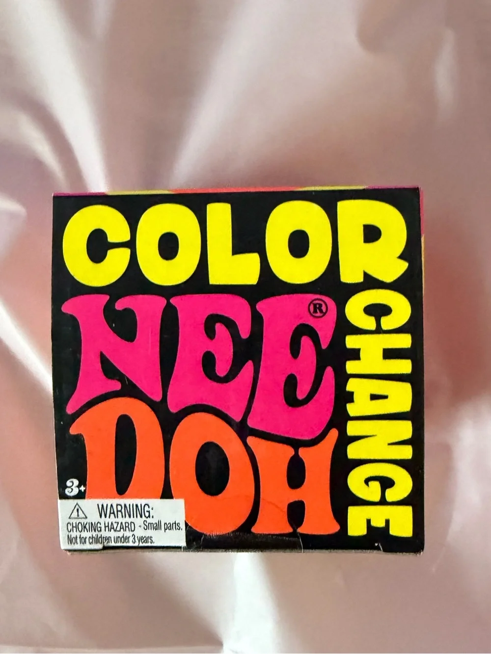 Color NeeDoh Color Change Kids Toy - Black with Bright Yellow & Orange